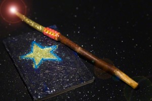 15 Jan 2012 --- Magic Wand and Booklet --- Image by © Snap Decision/Glasshouse Images/Corbis